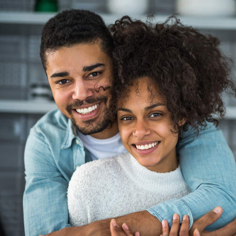 a couple smiling