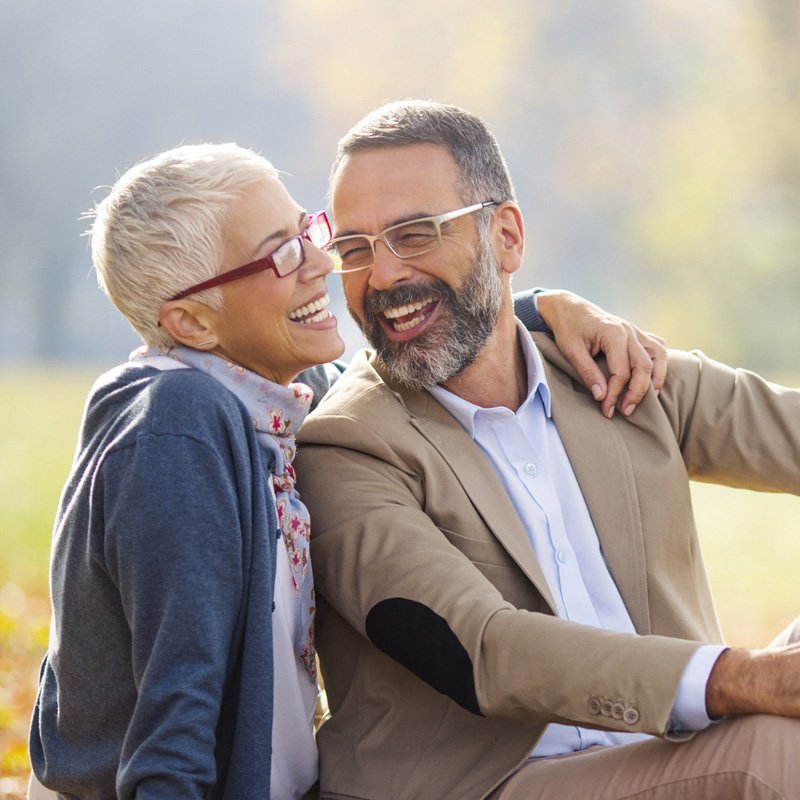 Couple with clean, healthy smiles after a bi-annual dental checkup and cleaning in Millersville, MD
